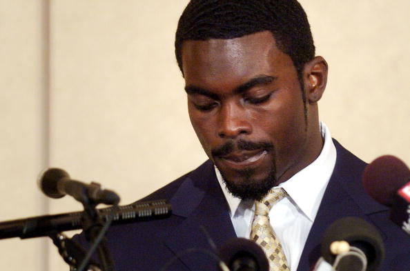 RICHMOND, VA - AUGUST 27:  Atlanta Falcons quarterback Michael Vick speaks to reporters at the Omni Richmond Hotel after agreeing to a guilty plea on charges stemming from his involvement in a dogfighting ring August 27, 2007, in Richmond, Virginia.  (Photo by Jonathan Ernst/Getty Images)